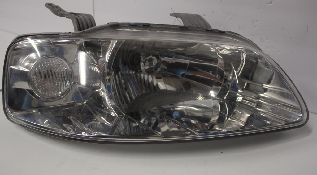 2004-2008 CHEVY AVEO FRONT PASSENGER SIDE HEADLIGHT 28315 - BIGGSMOTORING.COM